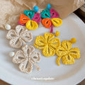 Woven Five Petal Flower Earrings With Polished Metal Tone Details view 2