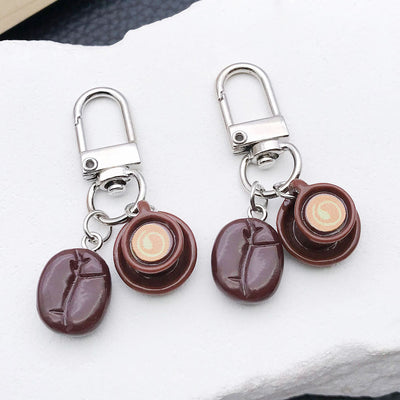 Main display of brown coffee bean and cup clasp keychains