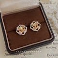 Gold Tone Fleur De Lis And Clear Stone Octagon Halo Stud Earrings view 1