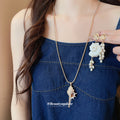 Gold Chain Conch Shell Necklace and Pearl Drop Earrings view 1