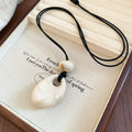 Translucent Teardrop Pendant Cord Necklaces in Three Colors view 6
