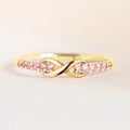 Pink Stone Infinity Band Ring In Four Metal Finishes view 3