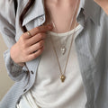 Pointed Heart Pendant Necklace in Gold and Silver Tones view 6