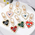 Gold Tone Pearl Crystal and Enamel Heart Clip Keychains view 1