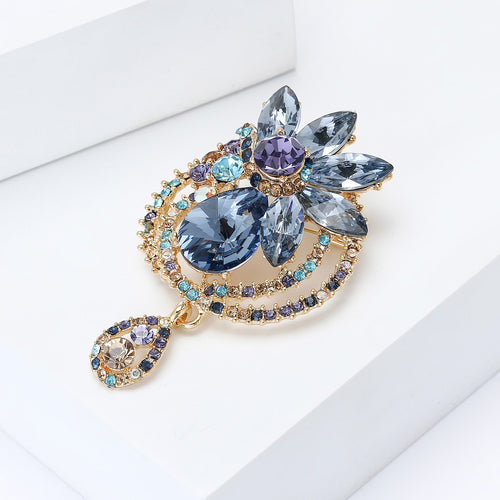 Angled product view showing the brooch surface details