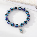 Silver Tone Blue Evil Eye Bead Stretch Bracelets with Six Charms view 10