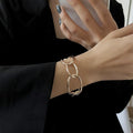 Oversized Irregular Oval Link Open Cuff Bracelet In Gold Or Silver Tone view 1