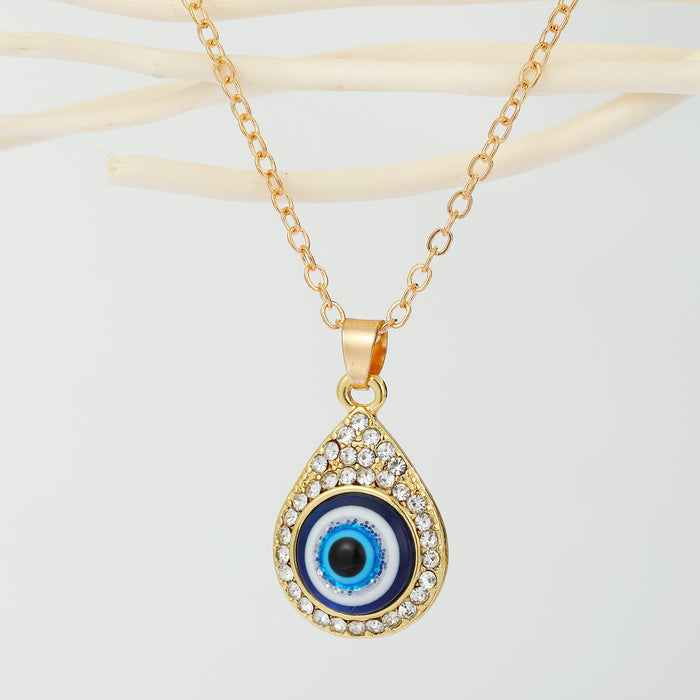 Gold Tone Crystal Teardrop Evil Eye Pendant Necklace with Fine Chain