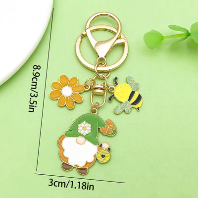 Dimension graphic showing bee and honeycomb keychains with printed 8.9cm/3.5in and 3cm/1.18in measurements.