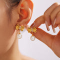 Bow Pearl Drop Stud Earrings with Rhinestone Center Gold Steel view 1