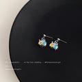 Silver Tone Spiky Cat Face Drop Earrings Mismatched Eyes view 4