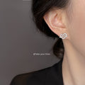 Silver Tone Clear Stone Double Heart Pretzel Knot Stud Earrings view 2