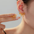 Gold Steel Beaded Bow Stud Titanium Steel Earrings Pair view 1