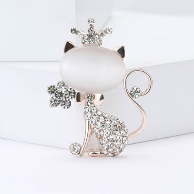 Front product view of the white cat brooch on a light background