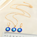 Round Blue Evil Eye Pendant Necklaces and Earrings in Two Finishes view 3