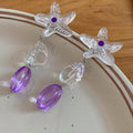 White Starfish Drop Earrings With Purple Bead Dangles view 6