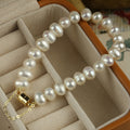White Freshwater Pearl Bracelet With Gold Tone Barrel Clasp view 6