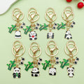 Panda Charm Keychains Featuring White Apple Across 45 Pictured Variations view 1