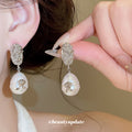 Silver Tone Crystal Leaf Studs With Large Faux Pearl Drops view 2