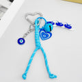 Blue Braided Cord Keychain With Heart Charm And Bell view 2
