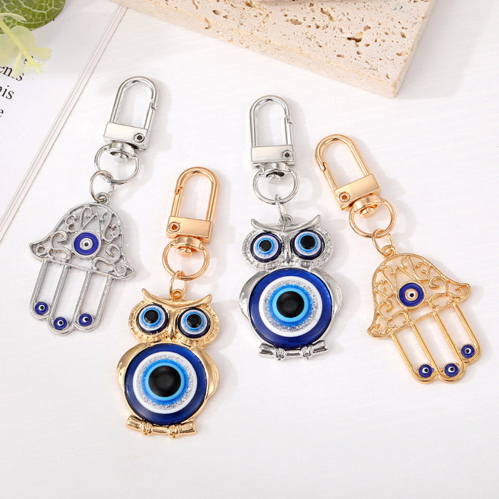 Gold and Silver Tone Owl and Hamsa Evil Eye Clip Keychains