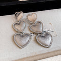 Triple Open Heart Drop Earrings in Gold or Silver Tone view 2