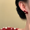 Red Flocked Horse Bow Stud Earrings with Distinctive Textured Details view 4