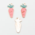 Pink Carrot Enamel Charm with Green Leaf Detail and Gold Tone Edge view 1