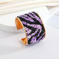 Gold Tone Seed Bead Animal Pattern Wide Cuff Bracelets in Six Designs view 9