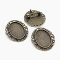 Ornate Oval Cabochon Brooch Settings in Three Metal Finishes view 2