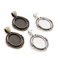 Scroll Edge Oval Pendant Cabochon Settings in Two Finishes view 1