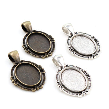 Scroll Edge Oval Pendant Cabochon Settings in Two Finishes