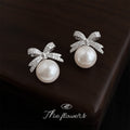 Silver Crystal Bow Pearl Drop Stud Earrings Metal Pair view 3