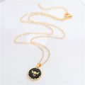 Gold Tone Black and White Winged Skull Round Pendant Necklaces view 5