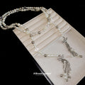 Long Pearl Strand And Crystal Bow Silver Tassel Necklace view 4
