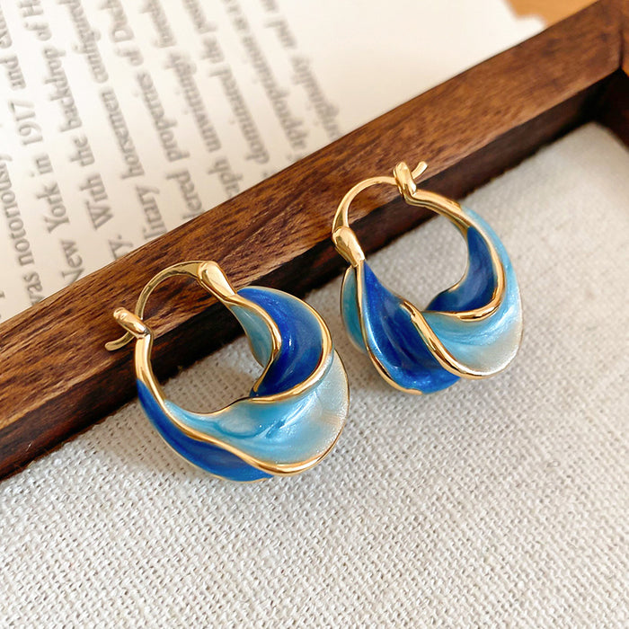 Blue Enamel Twisted Hoop Earrings with Gold Tone Trim