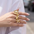 Oversized Pearl Center Flower Rings in Three Gold Tone Designs view 4