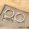 Round Clear Stone Hoop Earrings In Polished Gold And Silver Tones view 4