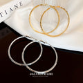 Multi Hoop and Twisted Hoop Earrings in Eight Metallic Styles view 3