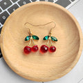 Faceted Cherry Dangle Earrings Green Leaf Accents 2 Colors view 2