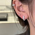Crystal Curved Huggie Hoop Earrings with Distinctive Textured Details view 3