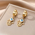 Gold Tone Hamsa Star and Lash Evil Eye Huggie Drop Earrings view 11