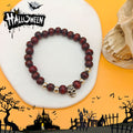 Dark Red Wood Bead Skull Stretch Bracelet Silver Accents view 1
