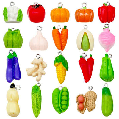 Multicolor assorted shape charms arranged on a light background