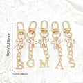 Gold Tone Initial Letter Bag Charm with Pastel Enamel Bow view 3