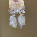 Clear Petal Flower Earrings With Crystal Clusters In Two Tones view 2