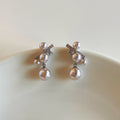 Silver Crystal Bow And Pearl Drop Stud Earrings For Pierced Ears view 3