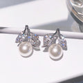 Faux Pearl Leaf Stud Earrings Gold Tone and Silver Tone view 5