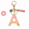 Resin Initial Letter Keychain with Evil Eye and Pink Tassel view 5