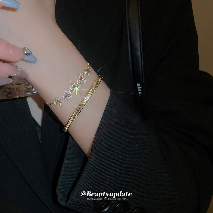 Three Gold Tone Flower Crystal Chain Bracelets And Slim Hinged Bangle